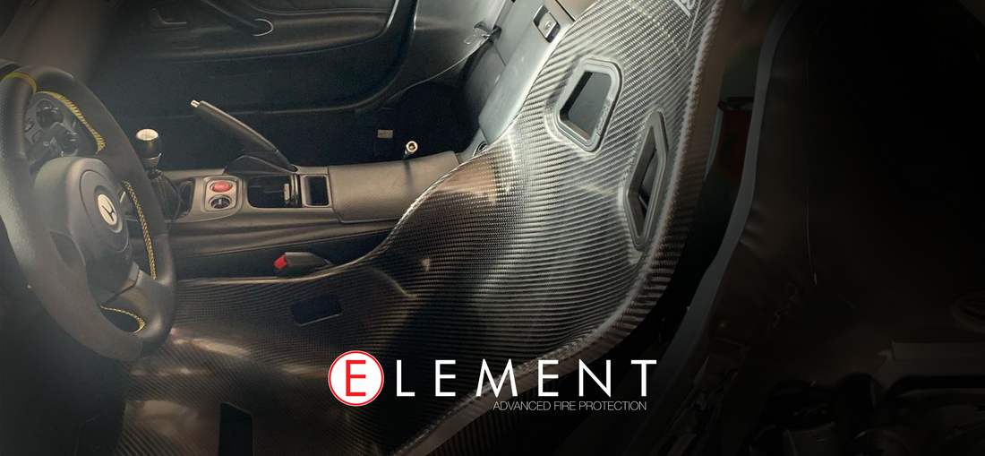 Car interior with carbon fiber seats. 